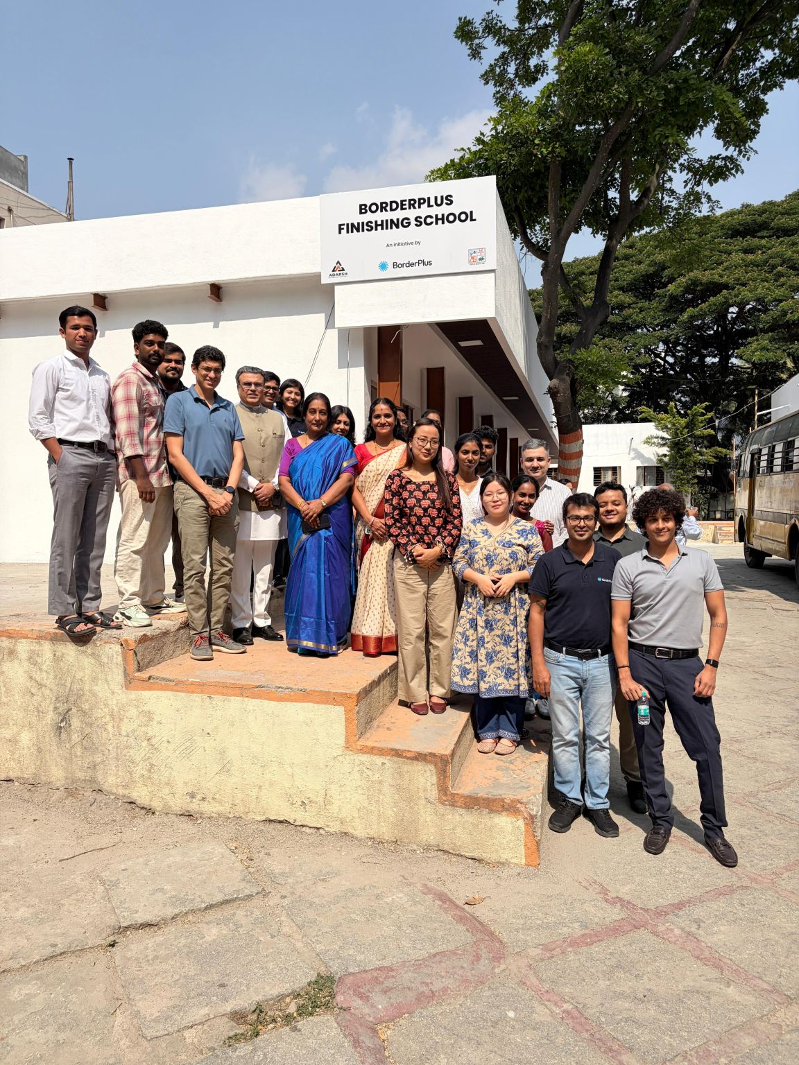 BorderPlus Finishing School students and faculty group photo outside the training center
